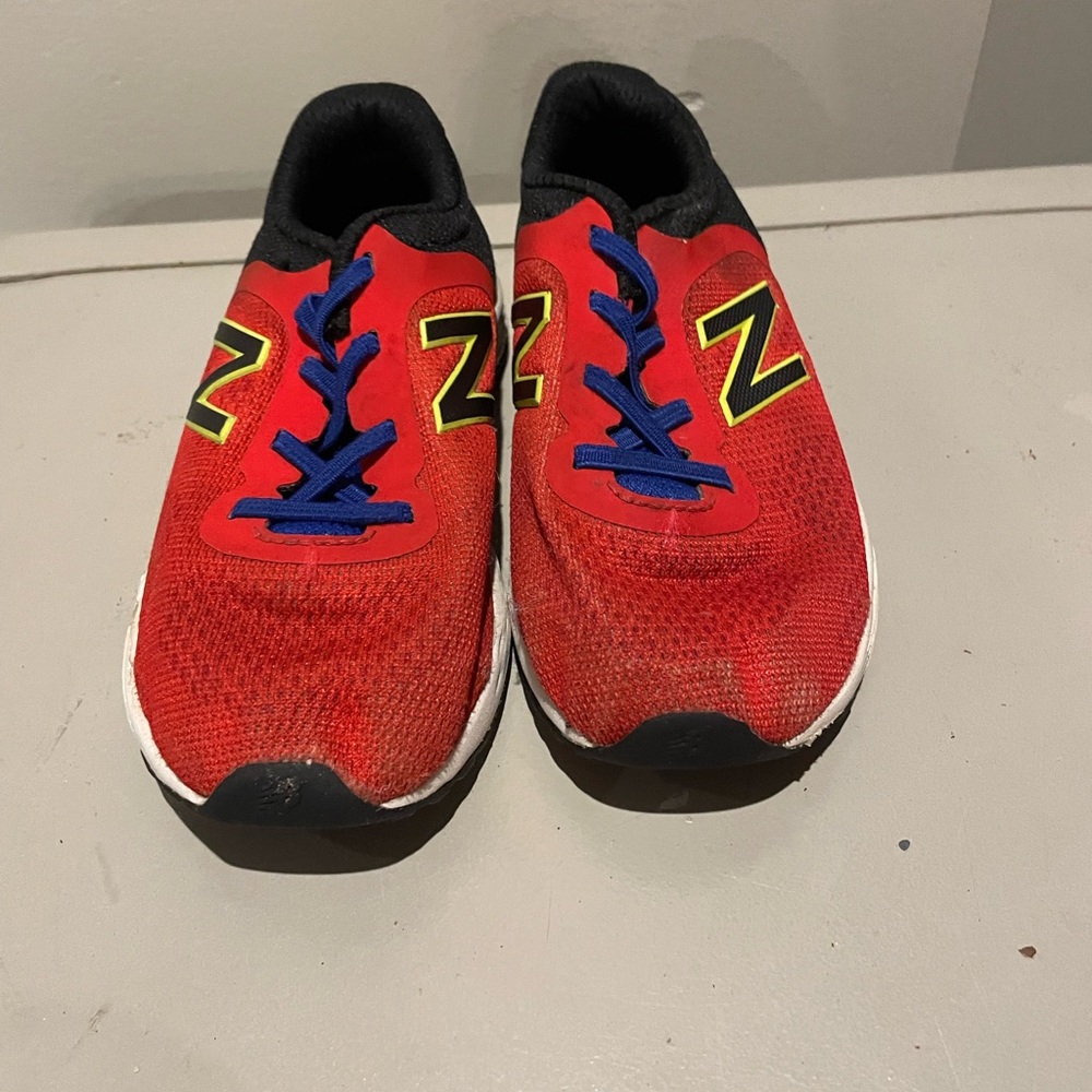 New Balance Kids Red and Black Sneakers with Blue Laces